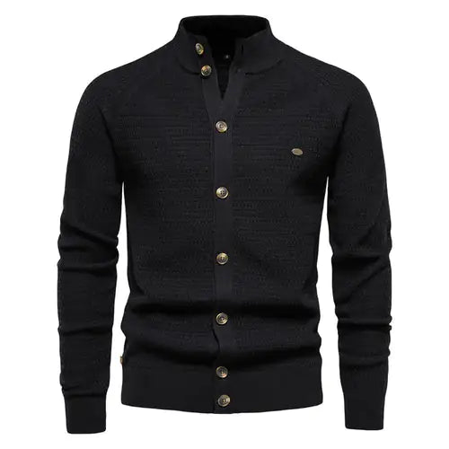 A sophisticated knitted cardigan with a mandarin collar and a button-up front. The cardigan features a textured pattern, ribbed cuffs and hem, and brown-toned buttons that add a stylish contrast. A small embroidered logo is visible on the left chest, enhancing its elegant design