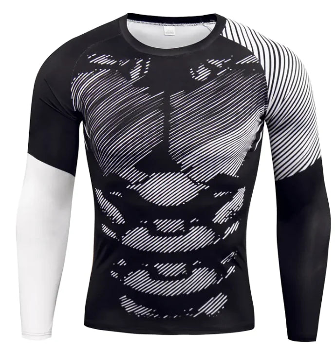 A long-sleeved athletic compression shirt with a gray, black, and white camouflage pattern on the front and sleeves. The shirt has black side panels and raglan-style sleeves, giving it a sporty and fitted design. The fabric appears to be stretchy and moisture-wicking, suitable for workouts or outdoor activities.