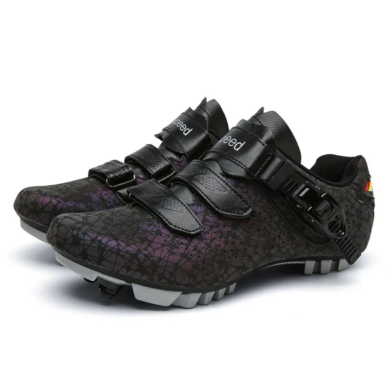 A pair of vibrant cycling shoes with a black and neon yellow camouflage pattern. The shoes feature a rugged sole with cleats, suitable for mountain biking or off-road cycling. They have two Velcro straps and a buckle fastening system for a secure fit. One shoe is placed upright while the other rests on its side, displaying the cleated sole.