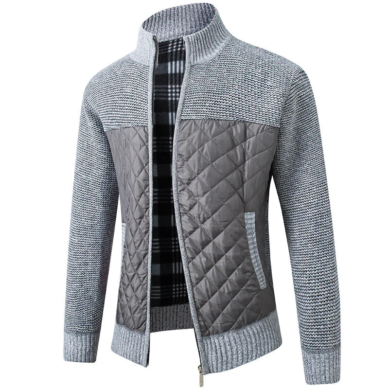 A stylish men's jacket with a combination of quilted and knitted fabric in a deep burgundy color. The upper part, sleeves, and collar feature a textured knit pattern, while the lower front and back panels have a quilted, padded design. The jacket has a full-length zipper, a high collar, and a plaid-patterned inner lining for added warmth and style.