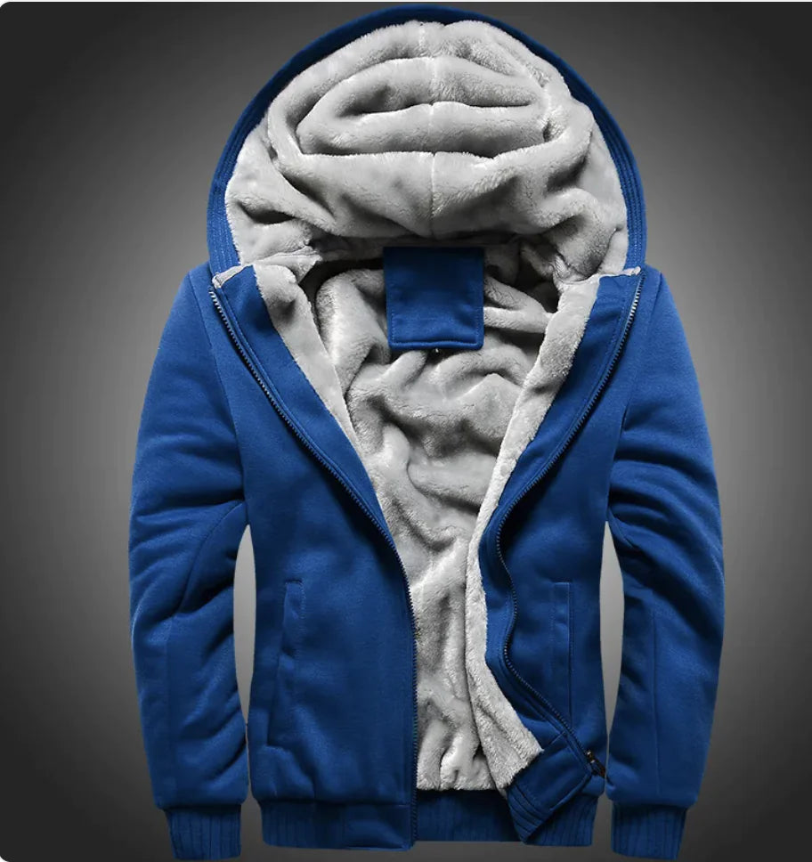 A stylish two-tone hoodie with a navy blue body and red sleeves, featuring a thick, plush gray fleece lining for warmth. The hood is large and lined with the same soft material, and the jacket includes a full-length zipper and two front pockets with red accents. Designed for cold weather comfort.