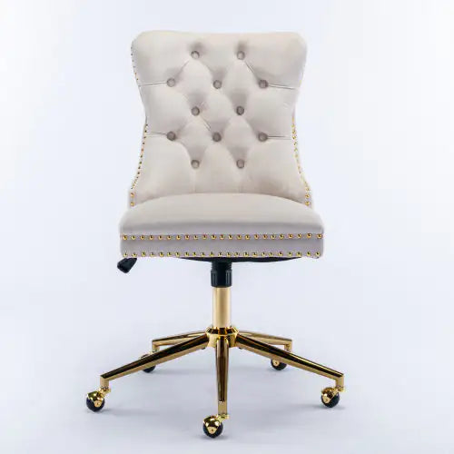 Beige office chair with gold accents on a white background