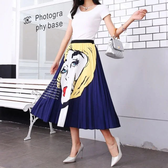 Pleated midi skirt with a gradient design, transitioning from dark black at the waistband to a soft blush pink at the hem, hanging on a black clothing rack next to a vintage-style camera.