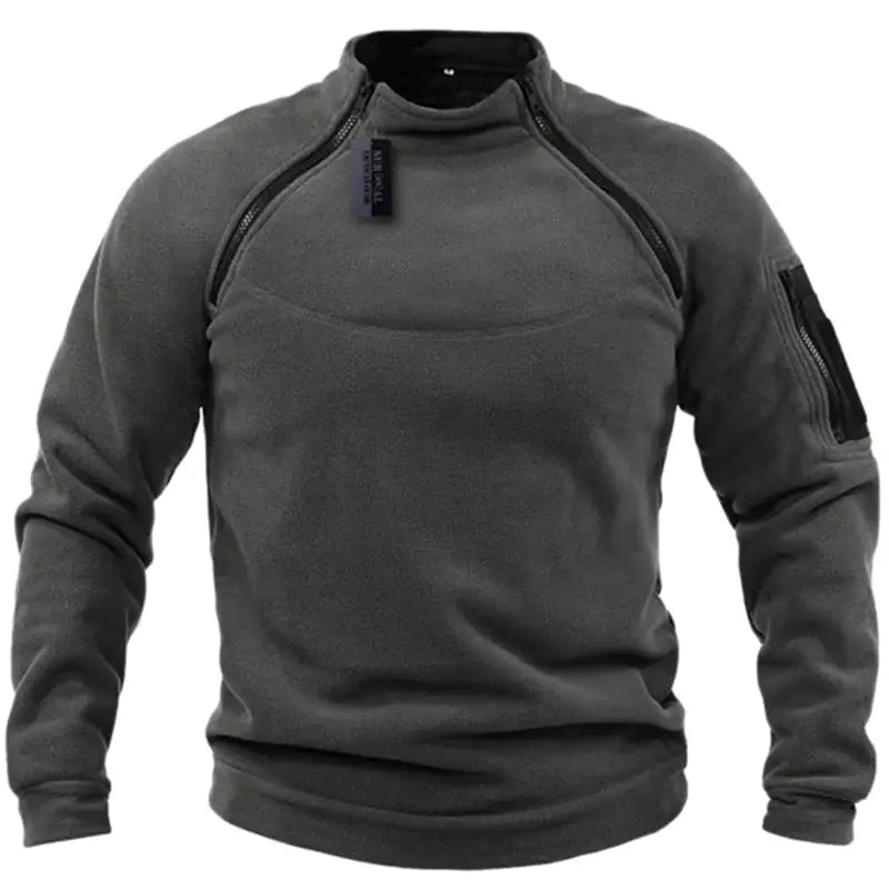 A long-sleeve fleece pullover with zipper detailing on the shoulders and a zippered pocket on the left sleeve.