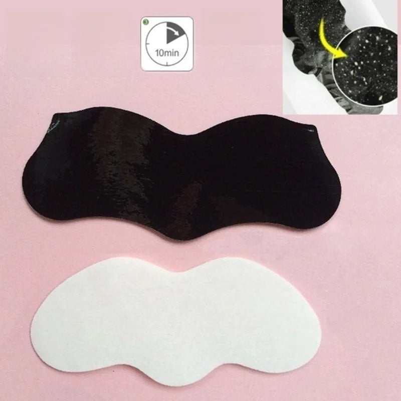 Black and white eye masks on a pink background with a small inset showing a close-up of the black mask.