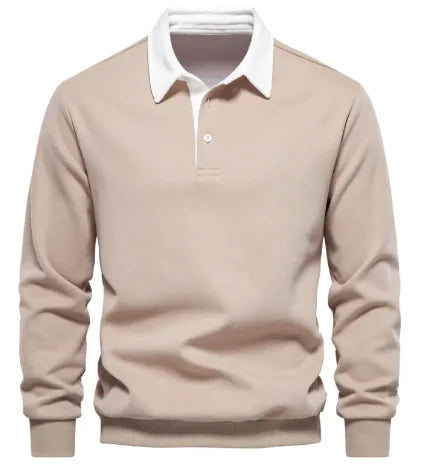 A long-sleeve polo shirt with a white collar and a three-button placket. The fabric appears soft, and the cuffs and hem have a fitted design. The shirt has a classic and stylish look, suitable for both casual and semi-formal wear.