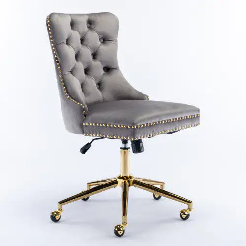 Gray office chair with gold accents on a white background
