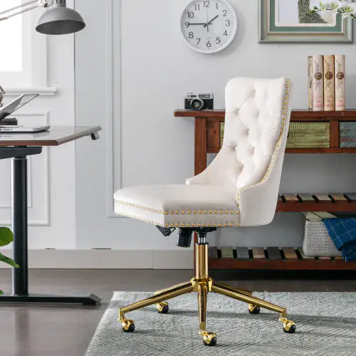 White office chair with gold accents in a home office setting
