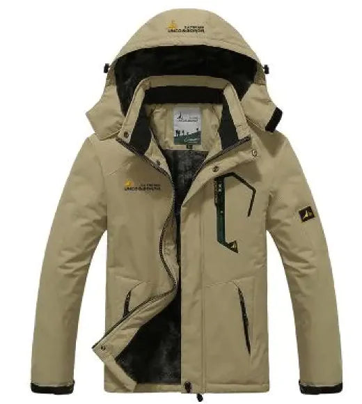 A green and gray outdoor jacket with a hood, multiple zippered pockets, and a logo on the chest and sleeve. The jacket appears to be designed for cold or wet weather, with a waterproof or windproof material.