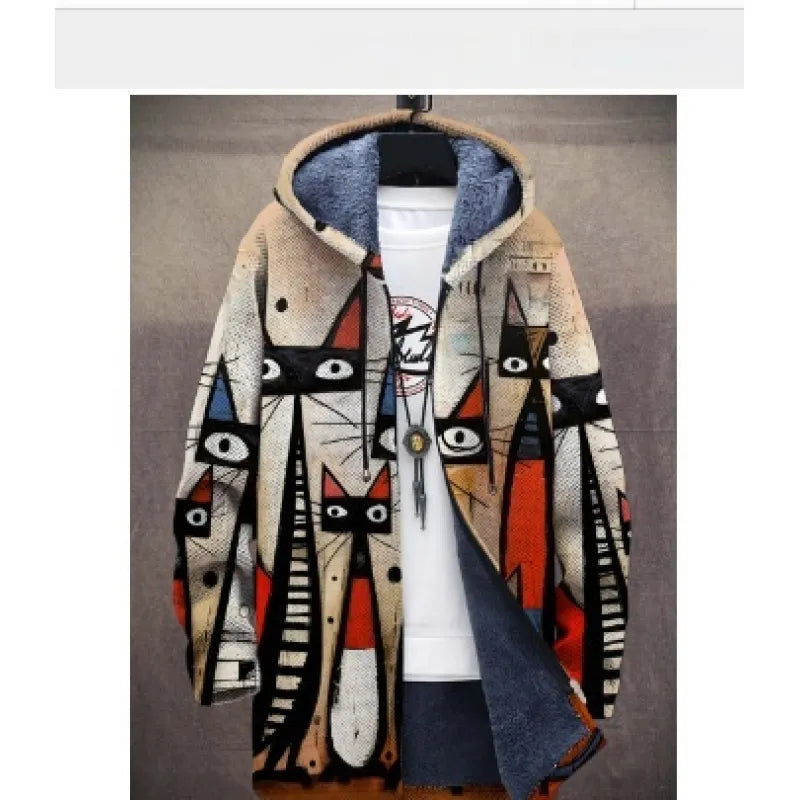 A stylish hooded jacket with a unique abstract cat print design in beige, black, red, and orange tones. The jacket has a cozy fleece-lined interior, a front zipper, and drawstrings on the hood. It is layered over a white T-shirt with a graphic print and accessorized with a long pendant necklace.