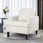 White armchair in a modern living room setting with a small table and plant.