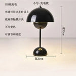 Diagram of a small black dome-shaped table lamp on a white background with Chinese text and size markings showing 33 cm height and 20 cm width.