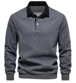 A long-sleeve polo shirt with a white collar and a three-button placket. The fabric appears soft, and the cuffs and hem have a fitted design. The shirt has a classic and stylish look, suitable for both casual and semi-formal wear.
