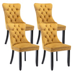 Two mustard yellow tufted chairs on a white background