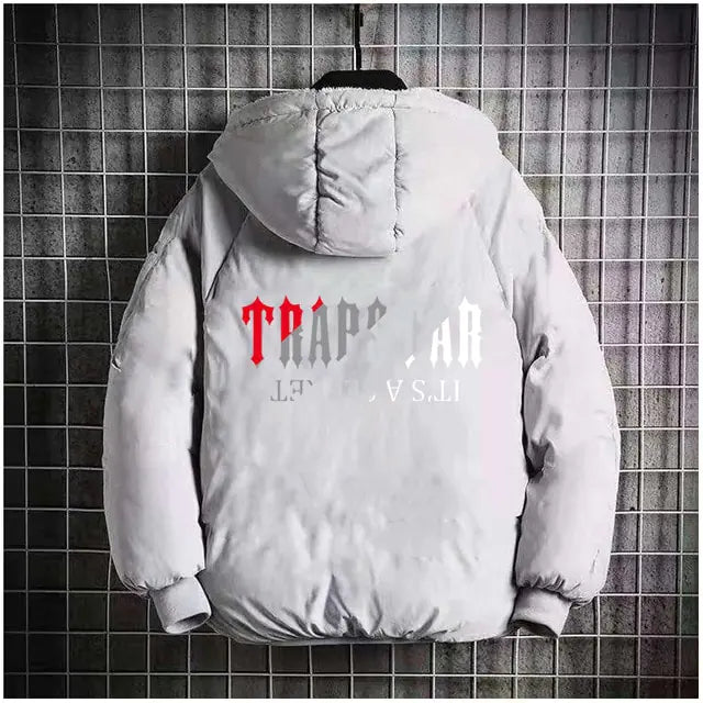 Light grey hooded puffer jacket with graphic text on the back, shown hanging against a wire grid wall.