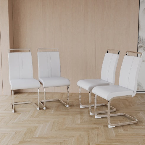 Four white chairs with metal legs on a wooden floor against a beige wall.
