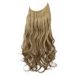 Long wavy clip-in hair extension in light sandy blonde, shown on a white background with the label “#25 Light Sandy Blonde.