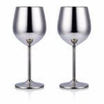 Two silver wine glasses on a white background