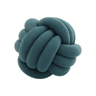 Teal knotted cushion ball made from thick, braided fabric tubes, shown on a white background.