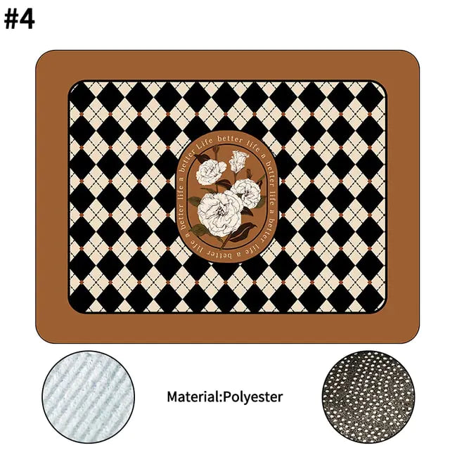 Decorative rectangular polyester mat with a brown border, black and cream diamond pattern, and a central floral emblem featuring white roses, shown with close-up fabric texture details.