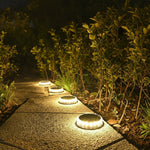 Set of 4 solar-powered ground lights