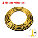 Product image of a coiled gold-colored strip/trim labeled “5 Meters with tool,” with a small inset showing a yellow plastic scraper tool marked “Gift,” on a white background.