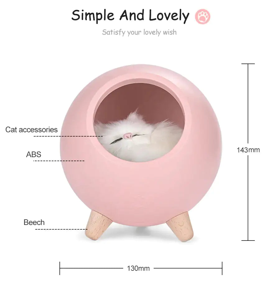 Product infographic showing a pink spherical cat house on short wooden legs with a round opening and a fluffy white cat inside, labeled with dimensions (130 mm wide, 143 mm tall) and materials.