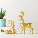 Gold geometric deer figurine home décor set.