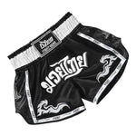 Black Muay Thai fight shorts with white waistband, bold white lettering, and “FIGHT” trim on a white background.