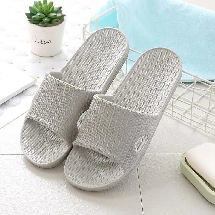 Home slippers with secure grip