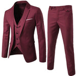Burgundy three-piece suit set on a white background—tailored blazer with matching buttoned vest and matching dress trousers displayed beside it.
