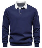 A long-sleeve polo shirt with a white collar and a three-button placket. The fabric appears soft, and the cuffs and hem have a fitted design. The shirt has a classic and stylish look, suitable for both casual and semi-formal wear.