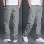 Gray cargo pants shown from front and back on a gray background