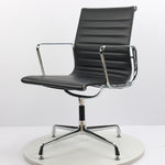Black office chair with chrome frame on a white background