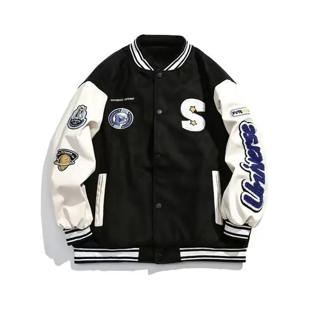 Black and white varsity jacket with snap buttons and embroidered patches.
