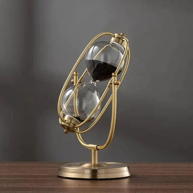 Precision rotating metal hourglass with sand