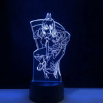 Blue anime-style LED acrylic night light on a black base.