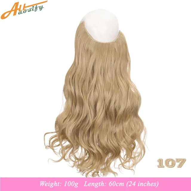 Long, wavy blonde hairpiece/wig shown from the back with a small top cap on a white background; text indicates weight 100 g and length 60 cm (24 inches), with color code “107.”