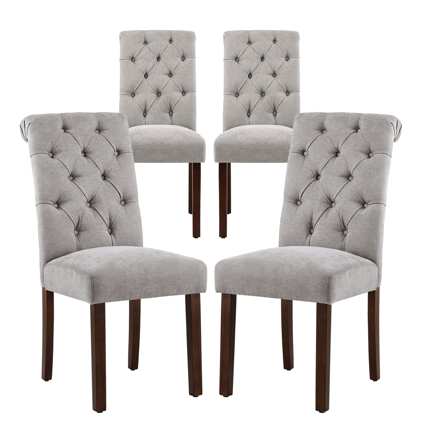 Four gray tufted dining chairs with wooden legs on a white background