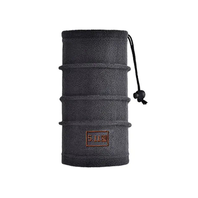 Black fleece neck warmer with drawstring and small front logo patch.
