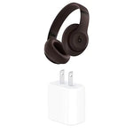 Brown Beats over-ear wireless headphones shown at an angle on a white background, with padded earcups and the “b” logo on the earcup.