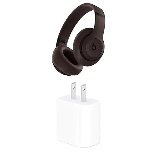 Brown Beats over-ear wireless headphones shown at an angle on a white background, with padded earcups and the “b” logo on the earcup.