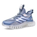 Light blue knit sneaker with lace-up closure, translucent side cage accents, pull tabs, and a chunky sculpted translucent sole.