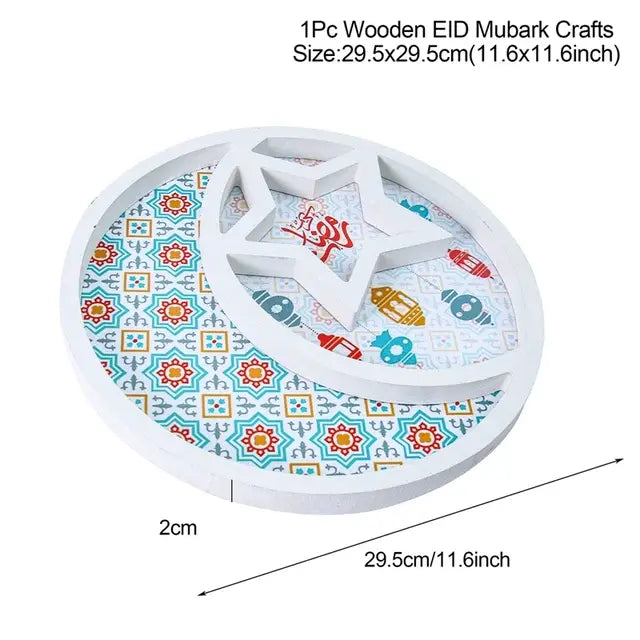A white wooden decorative piece for Eid Mubarak with a crescent moon and star design. The background features colorful, traditional patterns with lanterns, and the dimensions are provided (29.5cm x 29.5cm or 11.6 inches).