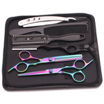 Haircutting tool kit in a zippered case, including two silver hair scissors (one thinning shears), a black comb, and a rainbow-finish straight razor, arranged on a black interior.
