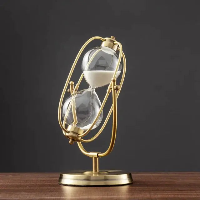 Hourglass with metal frame and rotating sand feature