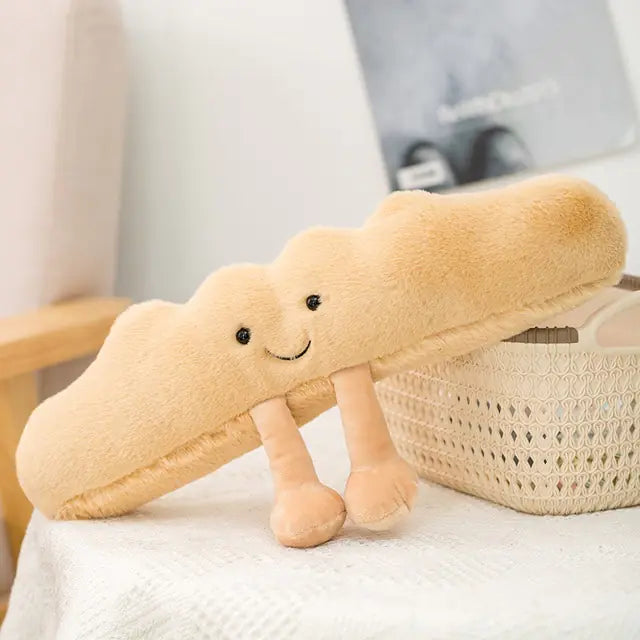 This is an image of a cute, plush cloud-shaped pillow with little legs and a smiling face, making it look like a friendly character.