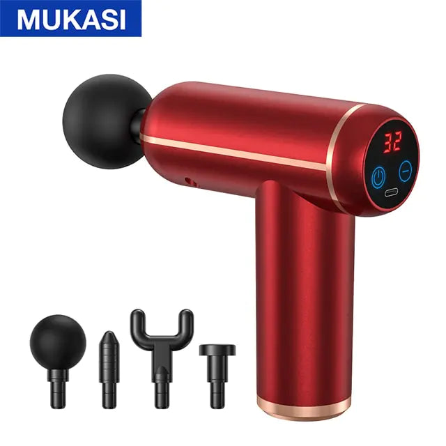Red handheld massage gun with rose-gold accents and a black ball head attached, shown with a carrying case and four interchangeable massage attachments on a white background.