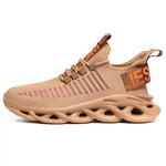 Tan knitted trainers with hollow cushioned sole.