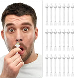 Man holding a white electric toothbrush head with multiple toothbrush heads displayed on a white background.